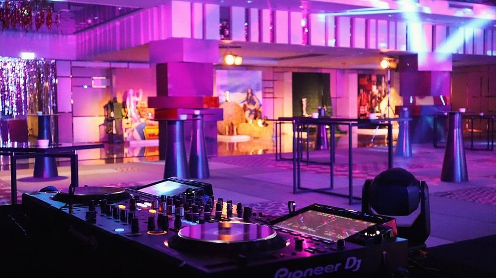 Corporate gala with stage lighting and LED screens