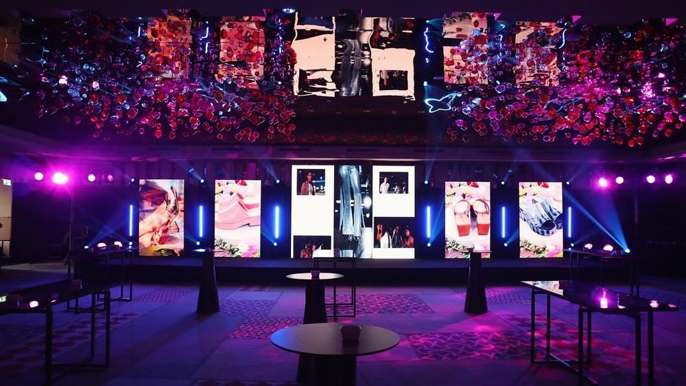 LED screen and stage lighting at a corporate event